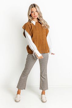 - This cutie is giving pumpkin spice vibes!
 - Tight knit material featuring block and cable knit patterns
 - A crew cut neckline with a ribbed texture
 - Short sleeves
 - A relaxed silhouette that ends in a straight hemline with ribbed detail Trendy Ribbed Sweater Vest For Fall, Fall Textured Knit Sweater Vest With Crew Neck, Fall Textured Knit Crew Neck Sweater Vest, Textured Knit Crew Neck Sweater Vest For Fall, Brown Knit Sweater Vest For Work, Ribbed Sweater Vest For Workwear In Fall, Trendy Brown Sweater Vest For Fall, Brown Cable Knit Tops For Layering, Fall Layering Pointelle Knit Sweater Vest