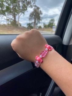 This bracelet has so many different pink and white charms on it! Anyone and i mean ANYONE can wear this bracelet It is very stretchy but please do not over stretch it because it may snap. Thanks for reading this! Trendy Pink Beaded Charm Bracelet, Trendy Pink Charm Bracelet With Letter Beads, Pink Adjustable Charm Bracelet For Friendship, Adjustable Pink Charm Bracelet With Letter Beads, Casual Pink Beaded Charm Bracelet, Trendy Pink Charm Bracelet For Friendship, Handmade Pink Charm Bracelet For Friendship, Trendy Pink Friendship Charm Bracelet, Pink Letter Beads Jewelry For Friendship