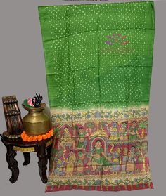 Hand Painted Bandhani Tussar Silk Saree, adorned with hand-painted designs with fine hand strokes.. Crafted with premium Tussar fabric and colored with natural dyes, it's sustainable and luxurious. Complete with fall and pico, and a fully stitched blouse, this saree is ready to flaunt your style with grace. Product: Hand painted bandhani Tussar Silk Saree Saree Color: green Saree Fabric: Pure Tussar colors may be slightly different because of the lighting,and  shades Traditional Art Silk Saree With Batik Print, Bollywood Style Traditional Wear With Batik Print In Chanderi, Festival Batik Print Saree, Festive Multicolor Batik Traditional Wear, Artistic Silk Dupatta With Pallu, Navratri Traditional Chanderi Batik Wear, Green Bandhani Print Dupatta For Festivals, Traditional Art Silk Dupatta With Batik Print, Chanderi Traditional Wear With Batik Print For Navratri