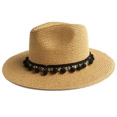 This stylish summer fedora is a must-have for any wardrobe. Its lightweight and packable material makes it great for travel, providing a fashionable way to block harsh sun and enjoy summer days. With an attractive pom-pom accent, this straw hat will be the perfect addition to your outfit. Stay fashionable in the sun with the Pom Pom Fedora Hat. The straw sun hat features a pom pom for eye-catching style, perfect for accentuating your summer look. This stylish accessory is the perfect way to add a bit of personality to your outfit. 100% paper straw. Measurements Brim: 2.76in / 7cmCircumference: 22in / 56cm Summer Fedora, Straw Sun Hat, Sun Hats For Women, Enjoy Summer, Paper Straws, Pom Pom Hat, Fedora Hat, Sun Hat, Straw Hat