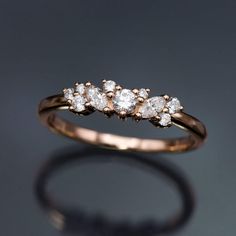 a three stone diamond ring in yellow gold