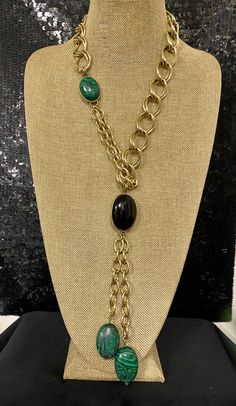 "Heidi Daus Black & Green with Black Lines Chains Cabs Lariat 25-1/2\" Necklace Product Description:- Heidi Daus oval shape cabochon simulated 4 gemstones. Show off your shimmering side with this illuminating necklace by Heidi Daus. Details:- Type: Necklace Style: Drop Metal: Bronze-tone Stone Color: Black & Green with Black Lines Stone Shape: Oval Finish: Oxidized, textured Necklace Measurements: Approx. 25-1/2\"L  Pendant Drops Measurements: Approx. 8\"L from top to bottom Country of Origin: C Line Stone, Heidi Daus, Tassel Drop Earrings, Wedding Jewellery Necklace, Wedding Necklace, Wedding Jewelry, Necklace Etsy, Fashion Jewelry, Beaded Necklace