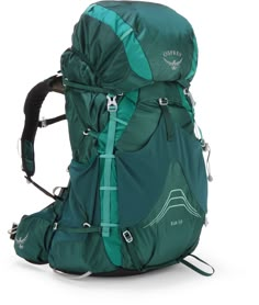 a backpack that is green and has straps on it