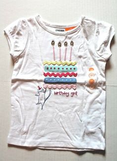 Gymboree Birthday Girl Tee Toddler Girl Size 2T Fits 30-33 lbs., 33-36 in. height White cotton knit shirt with a birthday cake sewn on the front and the words "Birthday Girl" stitched underneath it. The candles have gold gems for the flames. Some of the layers of the cake are yellow, red, or pink rick-rack. So cute! Brand New with Tags! Sweet Pink Top For Birthday, Casual Crew Neck Top For First Birthday, Sweet White Tops For Birthday, Sweet White Top For Birthday, Sweet T-shirt For Summer Birthday, Cute Birthday Top With Crew Neck, Fun Short Sleeve Tops For First Birthday, Cute Crew Neck Top For Birthday, Cute Graphic Print Top For Birthdays