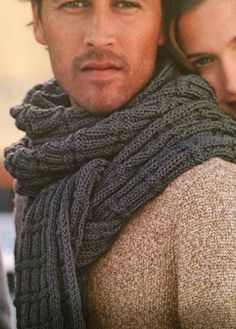 the man and woman are wearing scarves