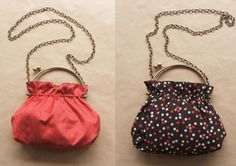 two purses are shown side by side, one is red and the other is black