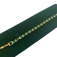 Add a touch of timeless elegance to your jewellery collection with this stunning round-cut green Emerald Tennis Bracelet, beautifully presented in a luxurious gift box. This bracelet features vibrant green emeralds, each meticulously round-cut to enhance their natural sparkle and set in a classic tennis bracelet design. Features: Perfect for special occasions such as anniversaries, birthdays, Mother's Day, or as a thoughtful gift for someone special. Comes in a beautifully crafted gift box, maki Luxury Green Tennis Bracelet As Gift, Bracelet Tennis, Bracelets Design, Wedding Jewelry Bracelets, Tennis Bracelet, Perfect Gift For Her, Elegant Jewelry, Wedding Bracelet, Emerald Green