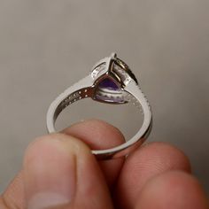 This is a gorgeous handmade creation. Its beauty is its simplicity & Elegance. The 8*8mm trillion shape faceted amethyst is crafted in solid sterling silver and with rhodium plated. All item is sent in a beautiful gift box You can realize more lovely stuff clicking the link https://www.etsy.com/shop/knightjewelry?refshopsection_shophome_leftnav Please leave the correct address and you phone number for delivering successfully. Luxury Sterling Silver Amethyst Ring For Engagement, Formal Hallmarked Sterling Silver Amethyst Ring, Gift Hallmarked Amethyst Ring In Sterling Silver, Formal Amethyst Ring In Sterling Silver, Vs Clarity, Nickel-free Amethyst Rings As Gifts, Amethyst Purple, Cute Rings, February Birth Stone, Amethyst Ring