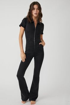 Style No. 79111068; Color Code: 001 Our top-rated Jayde Flares — now in a stunning jumpsuit! The timeless flare silhouette you know & love in a curve-hugging instant outfit. Fit: Slim through the bodice and thigh with flared leg designFeatures: Exaggerated yoking and darting throughout, zip-up closure, collared neckline, vintage-inspired denim wash, stretch denimWhy We <3 It: So flattering with sultry edge, you’ll be reaching for this jumpsuit from season to season. We The Free Heritage inspired and lived-in staples. We The Free is an in-house label. Care/Import Machine Wash Cold Import Measurements for size small Bust: 33 in Waist: 27 in Hips: 33 in Rise: 12 in Inseam: 33 in Sleeve length: 7.5 in Inseam (Short): 31 in Chic Fitted Flare Jumpsuits And Rompers, Spring Flare Fitted Jumpsuits And Rompers, Fitted Short Sleeve Jumpsuits For Fall, Chic Fitted Denim Jumpsuit With Short Sleeves, Black Fitted Denim Jumpsuit For Spring, Fitted Full-length Denim Jumpsuit, Denim Jumpsuit Short, Jumpsuit Short Sleeve, Free People Jumpsuit