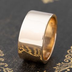 Chic and timeless cigar band from Tiffany & Co! She is the perfect index finger or middle finger ring and better yet, an engagement band or wedding band. Unique and one of a kind - she slips on like buttah on the finger! 14kt yellow gold Size 7.5 & resizable with limitations 10.4mm in width & 1.33mm thick 12.1 grams Please see qualitative report for more information. Heirloom Yellow Gold Wide Band Ring, Heirloom 14k Gold Wide Band Ring, Timeless Yellow Gold Wide Band Ring, Timeless Wide Band With Polished Finish, 14k White Gold Wide Band Ring, Wide Band 14k White Gold, Wide Band In 14k White Gold, Formal Rings With Decorative Wide Band, Engraved Wide Band Ring Stamped 14k