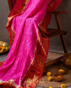 Add a touch of quirky elegance to your wardrobe with our Handtied bandhini Authentic Pure Silk handwoven mor-tota Yeola Paithani in rani pink. Made from luxurious silk, this bandhini piece is sure to make a statement with its playful color and traditional handwoven design. Perfect for any special occasion. (Limited quantities available!) Pink Slub Silk Dupatta For Transitional Season, Festive Pink Traditional Wear In Slub Silk, Festive Pink Slub Silk Traditional Wear, Unstitched Pink Bandhani Print Saree, Pink Bandhani Chanderi Traditional Wear, Pink Slub Silk Dupatta For Navratri, Pink Bandhani Print Saree For Diwali, Pink Raw Silk Traditional Wear For Ceremonies, Bohemian Pink Saree With Zari Weaving