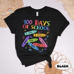 a t - shirt that says 100 days of school with crayons on it