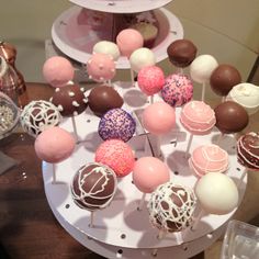 there are many different types of cake pops on the table