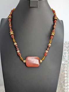 Carnelian is said to promote strength, ignite creativity, promote emotional balance, and physical health. Imagine the feeling of this big carnelian stone sitting on your skin and add to cart today. This is the perfect accent piece for a fall outfit or Thanksgiving dinner.   Make sure to grab this necklace while it lasts since it's a rare find! Measuring in at 25 inches long. Check out the rest of our shop for more unique gemstone beauties! Carnelian Stone, Emotional Balance, Unique Gemstones, Thanksgiving Dinner, Physical Health, Antique Copper, Fall Outfit, Accent Pieces, Necklace Etsy