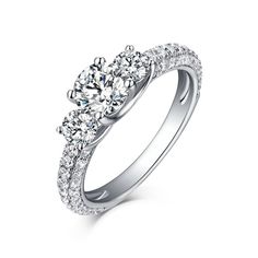 three stone engagement ring with round diamonds on the band and side stones around the band