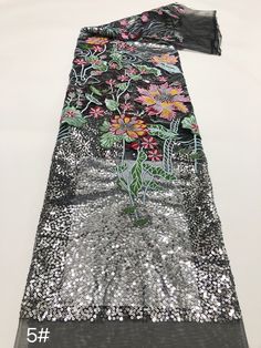 We offer a variety of fashion handmade fabric，those are widely use for wedding dress，garment and fashion cloth. we sell it by yard，our minimum order is 1 yards，and we always package it 15 yards for one roll，the width is 130cm/49 inch Material ： peals ,mesh ，Rayon,polyester. Symmetrical embroidery floral pattern, with lovely flowers in the middle, scalloped border. You can also cut and use separately. Perfect for dress, tops, wedding veil. You can split the piece up and have one scalloped edge ar Summer Wedding Contrast Sequin Fabric, Party Floral Embroidered Lace Fabric, Party Sequin Fabric With Floral Lace Applique, Party Sequin Lace Fabric With Floral Applique, Party Lace Sequin Fabric With Floral Applique, Spring Party Lace Sequin Fabric, Summer Lace Sequin Fabric, Glamorous Spring Wedding Sequin Fabric, Elegant Embroidered Fabric With Sequins For Spring