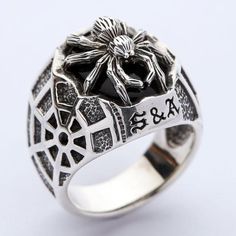 - We crafted this ring from 925 sterling silver;- 925 hallmark can be found on the ring’s exterior;- Comes with a black stone inlaid;- Ring face dimensions: 19 mm x 23 mm;- Weight: 17 grams;- The ring is made by hand. Handmade Black Signet Promise Ring, Symbolic Black Jewelry For Promise, Unique Black Signet Ring For Anniversary, Black Skull Ring With Open Design As Gift, Black Open Skull Ring As A Gift, Handmade Black Skull Ring As Gift, Black Symbolic Sterling Silver Jewelry, Black Sterling Silver Engraved Ring Gift, Symbolic Black Jewelry For Promise Ring