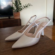 I Got These Shoes For My Wedding, They Are Italian Size 38.5 And Us Size 8.5. Ended Up Wearing Different Shoes, So Selling These. Comes In A Box With Dust Bag. The Heel Is Approx 80mm/3 Inches Chic Wedding Shoes With Heel Strap And Open Heel, Chic Closed Toe Slingback Pumps For Wedding, Fitted White Slingback Pumps For Evening, Leather Slingback Sandals For Spring Wedding, Leather Open Toe Slingback Pumps For Wedding, White Closed Toe Slingback Pumps For Formal Occasions, Spring Wedding Leather Slingback Sandals, Elegant White Slingback Wedding Shoes, Spring Gala Slingback Pumps With 4-inch Heel