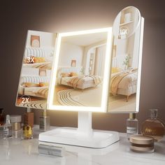 a lighted vanity mirror sitting on top of a counter next to a bottle of perfume