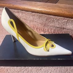 Bcbg Maxazria Off-White Leather Stiletto Pumps W/Canary Yellow Bow Design *Brand New* Size 6.5 B Color Off-White W/Canary Yellow Ribbon Design Pointed Toe Heel Approx 3.25” Leather Upper/Lower Sole Made In Brazil White Kitten Heels With 4-inch Heel For Formal Occasions, Chic White Kitten Heels, White Spring Court Shoes For Office, Cream Kitten Heels For Spring, White Court Shoes For Office In Spring, Chic White Kitten Heels For Spring, White Court Shoes For Spring Office Wear, Chic White Spring Kitten Heels, White Ankle Strap Kitten Heels For Office