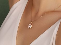 Oval Pearl Necklace PRODUCT INFORMATION DETAİLS *Metal Type: Solid 8K/14K/18K (White/Yellow/Rose) Gold *Center Gemstone: White (Pearl quality freshwater pearls with very high luster and smooth surface.) *Pearl Size : 7mm *Necklace Weight : 3 Gram *Side Stones :  1.10 mm *Chain Length Standard : 45 cm  ❥ Unless the Diamond option is purchased, your order will be sent with a zirconia stone.       GIFT  ❥ Your product will be sent in a nice high quality jewelry box. If you have a gift note at the t Elegant Round Pendant Necklace In Yellow Gold, Pearl White Gemstone Jewelry, Oval Yellow Gold Jewelry With High Luster, Oval Yellow Gold High Luster Jewelry, Elegant Yellow Gold Oval Pendant Necklace, Yellow Gold High Luster Pearl Necklace For Wedding, Exquisite Gold Pearl Necklace, Exquisite Pearl White Pendant Necklace, Elegant Oval Link Locket Jewelry