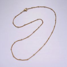 If you receive a defective item, please contact us within 5 days of arrival. Item Details - Material: Brass, 14K gold filled Chain style: Curb Clasp: Lobster clasp Length: 17.7 inches Width: 2.1 mm Please avoid any water or chemical solutions. Keep the chain in a dry environment. Gold Plated Ball Chain Necklace Gift, Gold Chain Necklace With Round Beads For Everyday, Gold-plated Ball Chain Necklace, Perfect As A Gift, Gift Beaded Link Chain Necklace, Gift Link Necklace With Beaded Chain, Gold Plated Chain Necklaces With Round Beads, Gold Plated Necklace With Round Beads Chain, Ball Chain Link Necklace For Gifts, Gift Ball Chain Link Necklace