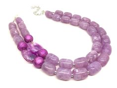 "A classic color that never goes out of style! Lavender / light purple beaded necklace and earring set. Necklace is 16 inches long with a 4 inch extender chain. Earrings are 2\" drop, a matching lavender bead with a fish hook style hardware. Thank you for supporting handmade and small American business! Hate to wait? Me too! I ship 6 days a week. Like this style but prefer another color? Check out our other BIG BEAD necklaces: https://www.etsy.com/shop/PolkaDotDrawer?ref=hdr_shop_menu&search Elegant Purple Necklace With Large Beads, Purple Necklaces With Polished Beads For Party, Purple Beaded Necklace, Purple Bead Necklace, Orange Jewelry, Purple Bridesmaid, Purple Bridesmaids, Crystal Statement Necklace, Necklace Big