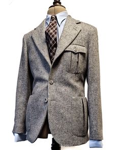 Perhaps the most iconic and versatile Cathcart piece ever produced. The single breasted King Cole suit is a mainstay of the collection, built faithfully from a 1930’s pattern. Customise this Cathcart bestseller to your liking, from lapel style to pocket shapes. Perfect for any event, day or night, wool or linen, and can be worn with either wide or straight leg suit trousers, or even plus-fours as well. Most definitely compatible with either a double breasted or single breasted waistcoat as a three piece, but also consider adding another waistcoat to have a contrast colour in the collection. Elegant Sport Coat With Patch Pockets And Flat Front, Classic Business Sport Coat With Patch Pockets, Luxury Tweed Jacket With Lapel Collar And Patch Pockets, Luxury Fitted Single-breasted Tweed Jacket, Semi-formal Tweed Jacket With Notch Lapel And Welt Pockets, Tailored Wool Suit With Patch Pockets, Classic Sport Coat With Suit Collar And Patch Pockets, Classic Wool Suits With Patch Pockets, Elegant Tweed Jacket With Patch Pockets And Notch Lapel