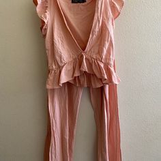 Summer Two-Piece Tender Pink Jumpsuit, Crop Top With A V-Neckline And Butterfly Sleeves. Matching High-Waisted Trousers With Open Pant Legs *No Tags. Washed But Never Worn* Casual V-neck Pant Set For Spring, Fitted V-neck Sets For Day Out, Feminine Pink V-neck Set, Feminine V-neck Sets For Summer, Feminine V-neck Summer Sets, Chic V-neck Spring Sleepwear, Spring Vacation Fitted Pant Set, Cotton V-neck Sets For Day Out, Two-piece V-neck Pant Set For Spring