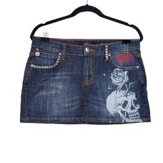 Ed Hardy Womens Rose Skull Print Studded Y2k Denim Mini Skirt Size 30 Ed Hardy Rose Skull Print Studded Y2k Denim Mini Skirt In Blue. Pockets And Belt Loops. Skull Rose Print. Logo Patch On Back. No Stains Or Holes. Casual Y2k Denim Mini Skirt. Size: 30 Length: 12" Waist: 16.5" Condition: Pre-Owned, Excellent Box B K/15/13pmed Rock Style Fitted Denim Bottoms, Fitted Rock Style Denim Bottoms, Fitted Denim Rock Bottoms, Rock Style Denim Bottoms For Streetwear, Denim Rock Bottoms For Streetwear, Rose Skull, Y2k Denim, Jean Mini Skirts, Embellished Denim