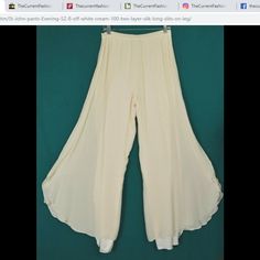 St John Evening pants - new without tags, cream or off-white. Outer layer 100% silk.  Lining 95% silk + 5% Spandex. Made in USA. Size 8 ... Read measurements in listing ~ http://thecurrentfashion.com , #TheCurrentFashion | #eBayFashion #eBay #ShopMyCloset #Poshmark #Bonanza #BonanzaMarket #fashion #style #pants #offwhite #offwhitepants #creampants #wideleg #widelegpants #crepepants #dressy #dressypants #silk #silkpants #StJohn #StJohnKnits #StJohnPants #StJohnEvening #MadeInUSA #MadeInAmerica Evening Pants, Off White Pants, Cream Pants, Dressy Pants, Cream Silk, Silk Pants