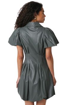 The Olivia Faux Leather Dress features a zipper front closure and a puff sleeves.Fabric ContentsSelf: 45% pu 55% polyesterLining: 100% polyesterMade in China Faux Leather Dress, Leather Dress, Caicos Islands, Trinidad And Tobago, Puff Sleeves, Faux Leather, China, Zipper, Leather