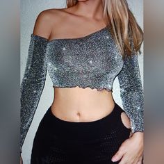 New Never Worn Shein Icon Asymmetrical Silver Neck Lettuce Trim Glitter Crop With Sleeves Top Large Shoulder 15.4/Length 16.7/Sleeve Length 25.6/Bust 35/Cuff 8.1/Bicep Length 12.4 67% Polyester Metalized Fibres 33% Metallic Sequin Crop Top For Party, Chic Long Sleeve Glitter Tops, Metallic Sequined Party Crop Top, Evening Stretch Glitter Tops, Asymmetrical Stretch Crop Top For Party, Sparkling Fitted Summer Tops, Sparkling Stretch Tops For Party, Metallic Fitted Tops For Party, Sparkling Long Sleeve Tops For Party Season