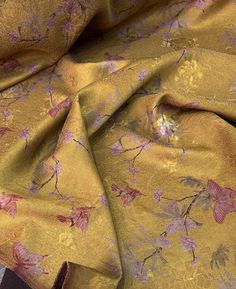 a yellow and pink floral print fabric