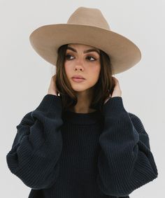 Ezra blends statement fashion with Western. A classic cattleman crown made to be styled for the city as much as the countryside. This hat features an upturned brim + a tall crown, giving Ezra a modern + feminine feel. Ezra comes with a removable tonal grosgrain band featuring a brass Gigi Pip pin. Other bands pictured are sold separately. Fall Fedora With Flat Crown, Everyday Fedora With Flat Crown For Fall, Classic Wide Brim Boater Hat For Fall, Fall Flat Brim Hat Bands For Everyday, Everyday Fall Fedora With Flat Crown, Everyday Flat Brim Hat Bands For Fall, Western Style Fedora For Fall, Western Fedora For Everyday Fall Wear, Western Style Fedora For Everyday Fall Wear