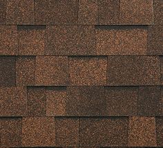 an ar logo is on the roof of a house that's shingled in