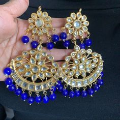 Beautiful Premium Quality Ac Kundan Jhumka Chandbali With Real Beads And Meenakari Works Heavy Patterns Traditional Blue Chandelier Earrings For Celebration, Blue Chandbali Jewelry With Cutdana Detail, Blue Chandbali Jewelry With Cutdana, Blue Cutdana Jewelry For Diwali, Blue Cutdana Chandbali Jewelry, Blue Temple Jewelry Jhumkas For Celebration, Blue Temple Jewelry Earrings For Diwali, Temple Style Blue Jhumkas For Celebration, Blue Temple Jewelry Earrings For Festivals