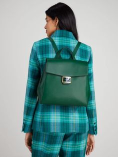 Our Katy bag is back—as a backpack. We kept its signature flap silhouette and glossy logo plaque so you're always elegant. | Kate Spade Katy Medium Flap Backpack, Arugula