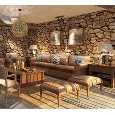 a living room with stone walls and furniture in the center, along with two lamps on either side of the couch