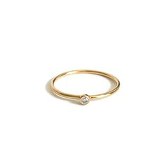 DESCRIPTIONThis dainty solitaire ring is made of 2mm cubic zirconia and gold filled wire. It's the perfect ring to wear by itself or stack it with other dainty rings. DETAILS- Cubic Zirconia size is 2mm- Made of gold filled wire- Available in sizes 4-8 Dainty Everyday Birthstone Ring With Single Diamond, Everyday Dainty Birthstone Ring With Single Diamond, Dainty Solitaire Stackable Rings For Everyday, Dainty Stackable Rings With Single Diamond For Everyday, Dainty Solitaire Birthstone Ring For Everyday, Dainty Everyday Stackable Rings With Single Diamond, Delicate Stackable Rings With Single Diamond, Gold Dainty Crystal Ring With Single Diamond, Dainty Stackable Rings With Single Diamond