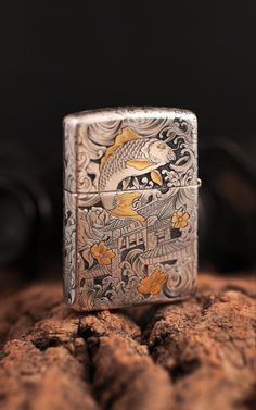 a lighter sitting on top of a rock