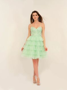 The Dave & Johnny 11182 Short Layered Tulle Lace Formal Homecoming Dress Cutout Back Gown is perfect for your next special occasion. This formal gown features a stylish cutout back and is made from layered tulle lace for a glamorous and timeless look. Dress to impress in this elegant and sophisticated gown.  Sizes: 00-18  Colors: Mint,  Fuchsia Pink, Navy Blue Short Layers, Short Layered, Formal Gown, Fuchsia Pink, Tulle Lace, Homecoming Dress, Formal Gowns, Homecoming Dresses, Homecoming