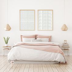 a bedroom with two paintings above the bed