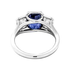 Inspired by modern influence and graphic lines , this Sapphire 3 stone ring will steal your heard with it`s beauty! Delicate, yet bold mounted in Platinum with 3.31ct Radiant Shape Sapphire and side stones emerald cut diamonds totaling 1.25ct G-H color and VS1 clarity. Center stone details: Weight: 3.31 carats Measurements: 9.09 x 6.84 x 5.77 mm Shape: Octagonal Transparency: Transparent Color: Blue Species: Natural Corundum Variety: Sapphire Luxury Radiant Cut Sapphire Ring With Center Stone, Luxury Gia Certified Princess Cut Sapphire Ring, Luxury Sapphire Ring With Radiant Cut And Accent Stones, Luxury Three Stone Sapphire Ring In Platinum, Luxury Three-stone Sapphire Ring In Platinum, Luxury Sapphire Birthstone Ring With Center Stone, Luxury Sapphire Birthstone Ring With Accent Stones, Luxury Blue Sapphire Ring With Center Stone, Luxury Three Stone Sapphire Ring For Women