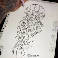 a drawing of a jellyfish on a sheet of paper