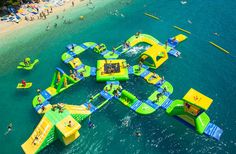 an inflatable water park on the beach