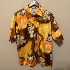 Size Medium No Rips Or Tears New With Tags Orange Relaxed Fit Hawaiian Shirt With Short Sleeves, Orange Short Sleeve Shirt For Vacation, Orange Short Sleeve Shirt With Buttons, Orange Cotton Top With Camp Collar, Brown Collared Beach Shirt, Orange Cotton Camp Shirt For Vacation, Casual Orange Camp Shirt For The Beach, Orange Summer Shirt With Button Closure, Orange Collared Camp Shirt For Summer