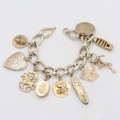 Weight: 56.8 Grams Charms: 17.5 - 23 x 26 mm Bracelet Size:  6.5 Inches Hallmark: F&B, Sterling Item #:  BR-1051-091823-18 Vintage Charm Bracelet, Dream Jewelry, Bracelet Sizes, Vintage Charms, Charm Bracelets, Arm Band, My World, Hallmark, Jewelry Bracelets