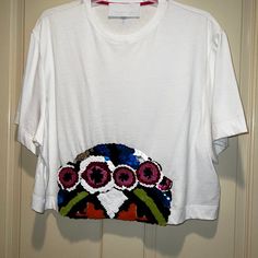 Cropped Cotton T-Shirt With Sequencing. Believed To Be From The 2019 Spring Collection. Never Worn. Pit To Pit 23", Neck To Lower Hem 17". Very Cool Look! White Embellished Crew Neck T-shirt, White Embellished Crew Neck Top, White Embellished Cotton Tops, Embellished Graphic Tee With Crew Neck, Summer Cotton Tops With Sequins, Summer Sequined Cotton Tops, Cotton Sequin Tops For Summer, Spring Embellished Crew Neck T-shirt, Embellished Crew Neck T-shirt For Spring