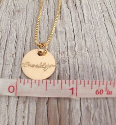 "A sweet mother or grandmother gift for the gold lover! Two to six hand stamped, half inch, gold filled 14k circle discs are shown in 1st photo stamped in the Type font. Letters are left natural with a brushed, shiny or hammered finish and hung from a gold filled 14k box chain. Please contact us for more than 6 charms or if you would like to add spacers for a custom listing. Spacers available for $2 each. Arrives in a sweet gift box for gift giving. PLEASE READ **SIZING: 4th photo shows size bas Grandmother Necklace, Family Jewellery, Grandmother Gifts, Mothers Necklace, Font Types, Sweet Gifts, Box Chain, Name Necklace, Kid Names